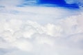 White clouds on blue sky background view from above, airplane flight landscape, beautiful aerial cloudscape, skies backdrop Royalty Free Stock Photo