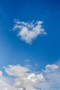 White clouds in the blue sky, cloud in the form of a heart_