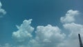 White clouds on blue sky in different shapes and size. Royalty Free Stock Photo