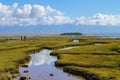 White clouds and blue sky has been reflected in the water of river. Royalty Free Stock Photo