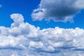 White clouds on a blue sky. Blue sky with heacy clouds.