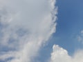 The white clouds on the blue sky are perfect for the background. Skyscape on Lombok Island, Indonesia Royalty Free Stock Photo