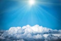 White clouds and bright sun on the blue sky Royalty Free Stock Photo