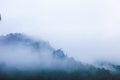 White clouds cover the mountains rocky Global Geopark in Ha Giang, Vietnam Royalty Free Stock Photo