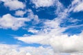 White clouds cumulus floating on blue sky for backgrounds concept