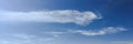 White clouds disappear in the hot sun on blue sky. Clouds on blue sky background. Weather nature blue sky with white cloud and sun Royalty Free Stock Photo