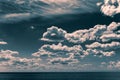 White clouds float in the sky over the Sea coast Royalty Free Stock Photo