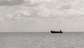 White clouds float in the sky over the Sea coast Royalty Free Stock Photo