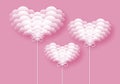 White clouds form hearts on pink background of greeting design for Valentines day or Wedding.