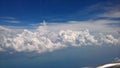 white clouds and raincloud in blue sky view From a plane Royalty Free Stock Photo