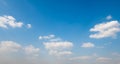 white cloudy with blue sky background