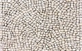 White cobblestone pavement, irregular pattern Royalty Free Stock Photo