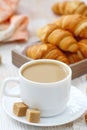 White coffee and croissant for breakfast