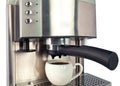 White coffee cup with black coffee and Coffee Machine .Close up on a white background Royalty Free Stock Photo