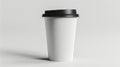 A white coffee cup with black lid on a gray background Royalty Free Stock Photo