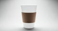 Blank coffee cup with brown sleeve isolated against white background Royalty Free Stock Photo