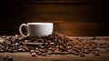 A white coffee cup full of coffee beans spilling out on a wood background Royalty Free Stock Photo