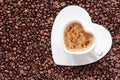 White coffee cup heart shaped with cappucino Royalty Free Stock Photo
