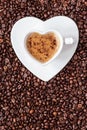 White coffee cup heart shaped with cappucino Royalty Free Stock Photo