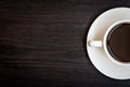 White coffee cup on wood table background with copy space, Half cup with full of coffee, Dark tone still life and vignette, Top Royalty Free Stock Photo