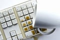 Coffee spilling over computer keyboard Royalty Free Stock Photo