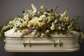 A white coffin with flowers. Burial ceremony.