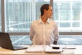 White collar worker male stretching arms, relaxing neck Royalty Free Stock Photo