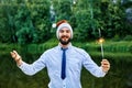 White collar worker with sparkler in hand Royalty Free Stock Photo