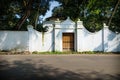 White colonial entrance of house along the road, Kochi, Kerala, India Royalty Free Stock Photo