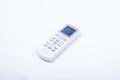 The white color of air-cond remote control. Royalty Free Stock Photo