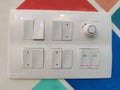 White color electric switch board modern design on a wall closeup shot Royalty Free Stock Photo