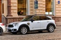 The white color Mini Countryman Plug-In Hybrid on the street