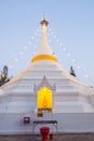 A white color of pagoda decorated by lighting at night time Royalty Free Stock Photo