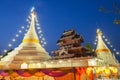 A white color of pagoda decorated by lighting at night time Royalty Free Stock Photo