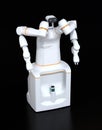 White color self-driving dual-arm robot on black background