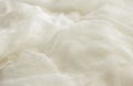 White color woven cotton gauze fabric background texture. close up top view