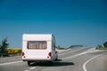 White Colour Motorhome Car Goes On Motorway Road