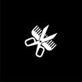 Comb and scissors icon or logo on dark background Royalty Free Stock Photo