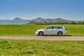 White combi car parked in scenic nature with view of Central Bohemian Highlands (Czech: ?eskÃ© St?edoho?Ã­) Royalty Free Stock Photo