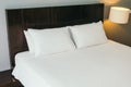 White comfortable pillow on bed