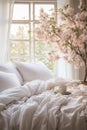 White Comforter Bed With Flower Vase