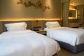 comfy twin bed in luxury hotel for rest in holidays Royalty Free Stock Photo