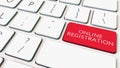 White computer keyboard and red online registration key. Conceptual 3D rendering Royalty Free Stock Photo