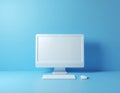 White computer monitor keyboard and mouse on blue background technology Royalty Free Stock Photo