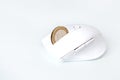 white computer mouse with a coin of 1 euro instead of a wheel, earnings on the Internet Royalty Free Stock Photo