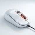 White computer mouse detail with illuminated scroll wheel Royalty Free Stock Photo