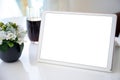 white computer tablet with isolated screen background table in cafe Royalty Free Stock Photo