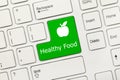 White conceptual keyboard - Healthy Food green key with apple s