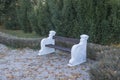 White concrete ancient bench in an old park Royalty Free Stock Photo