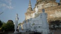 White concrete Buddha statues in the territory of Wat Yai Chai Mongkhon Buddhist temple in Ayutthaya, Thailand - gimble